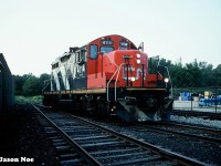 On a humid August evening, the CN 15:30 Kitchener Job has cut away from their cars they brought to Elmira, Ontario and are pictured running around them at the end of track of the Waterloo Spur. Shortly, GP9RM 4114 will begin switching the customers in Elmira, before heading back to Kitchener with darkness eventually overtaking the southbound train. 