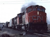 A trio of battle worn 9500s, lead by 9533, charge eastward out of MacMillan Yard Toronto, Ontario on a dull April afternoon.