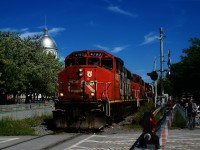 CN 500 is leaving the Port of Montreal with a 1,000 foot long train.