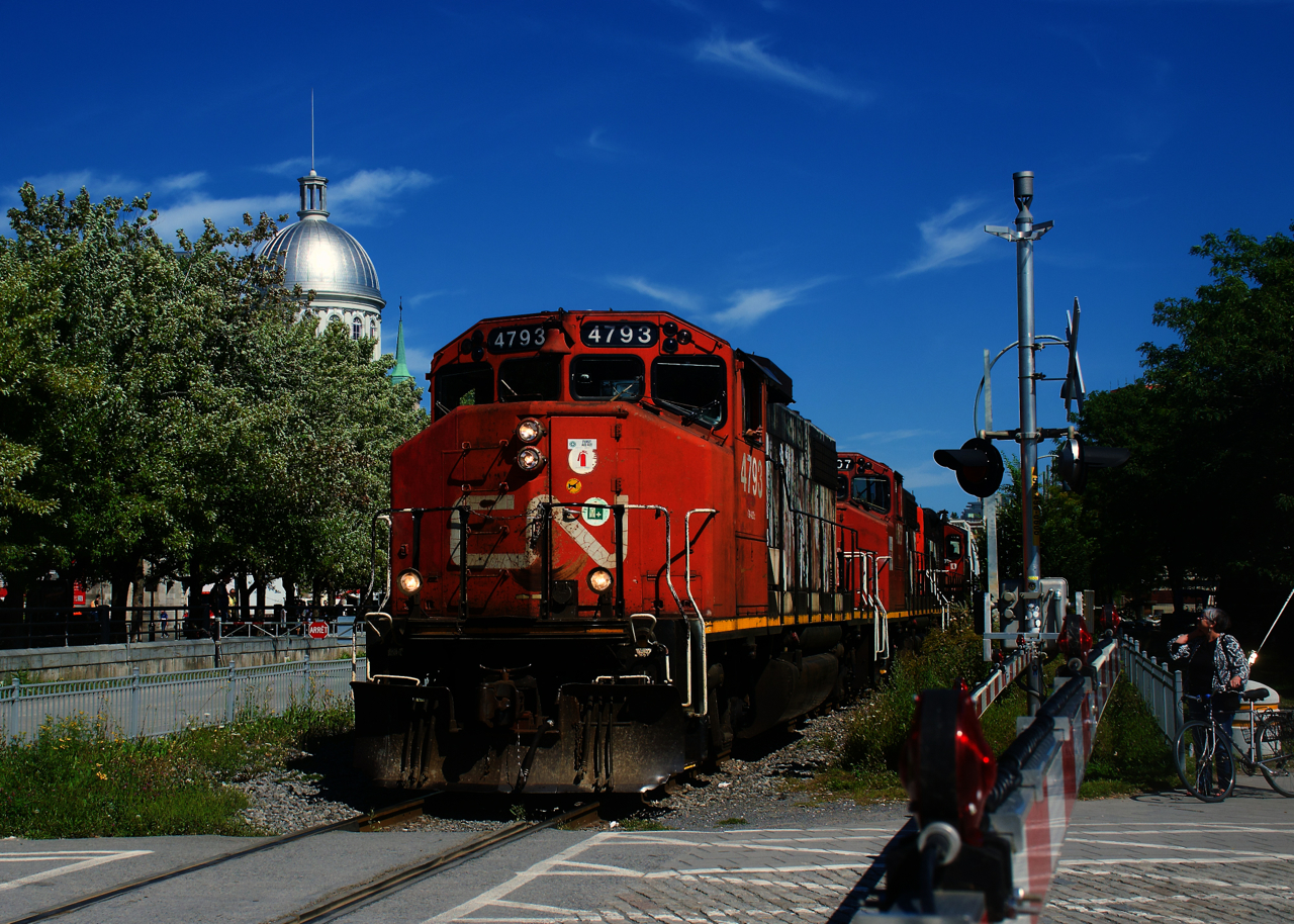 CN 500 is leaving the Port of Montreal with a 1,000 foot long train.