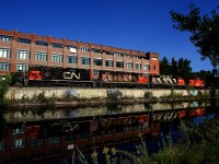 CN 500 is on the East Side Canal Bank Spur, on its way to lift two hoppers from Ardent Mills.