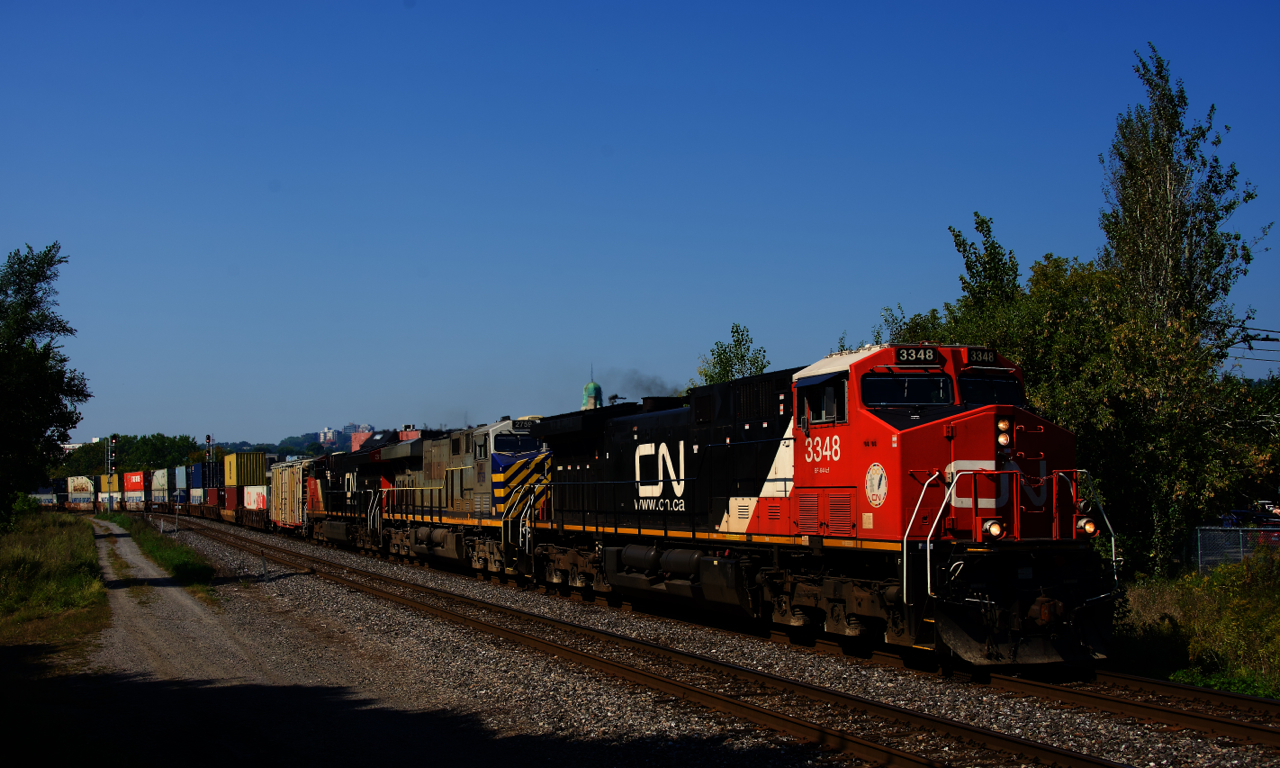 CN 3348 (rebuilt from Dash9 CN 2625) leads CN 120.