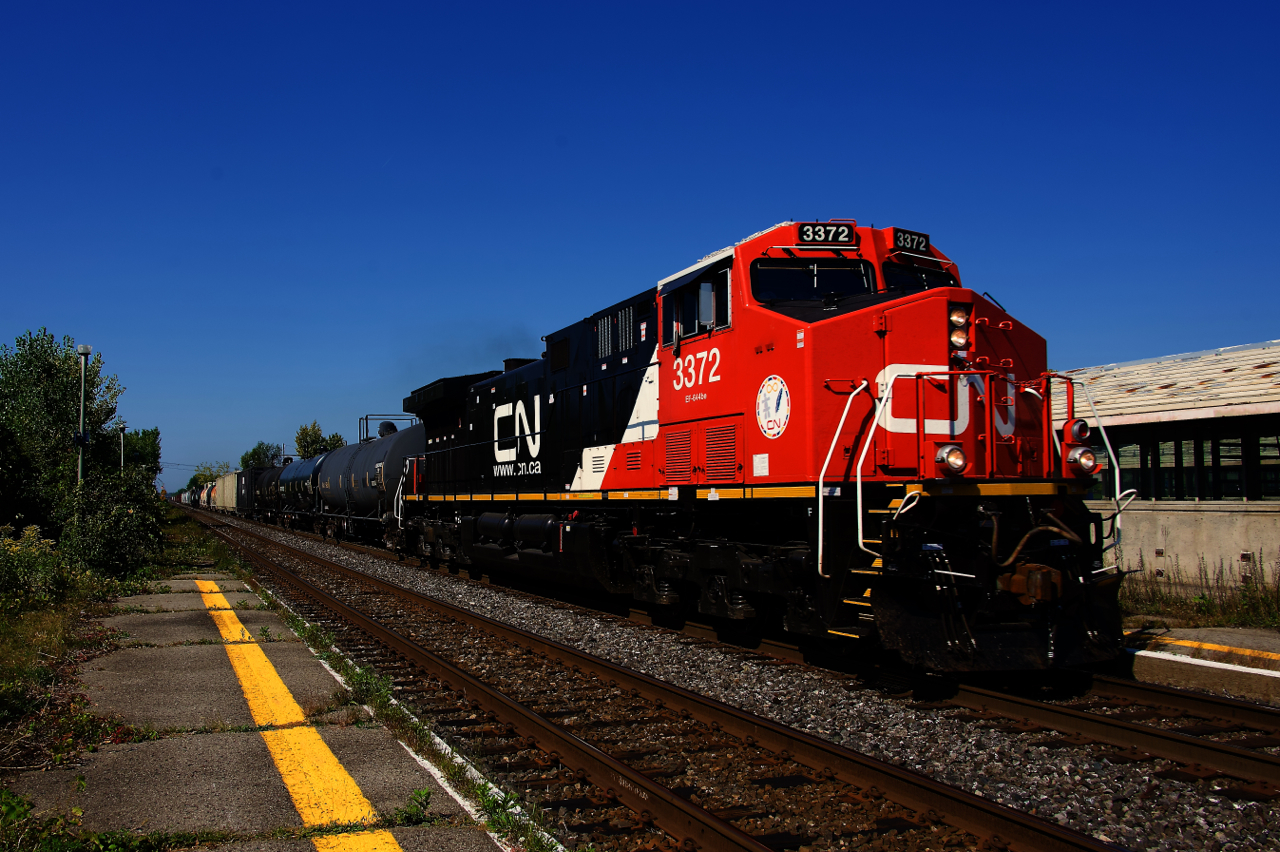 A fresh rebuild leads CN 368 through Dorval. CN 3372 was originally Dash9-44CW BNSF 4512.