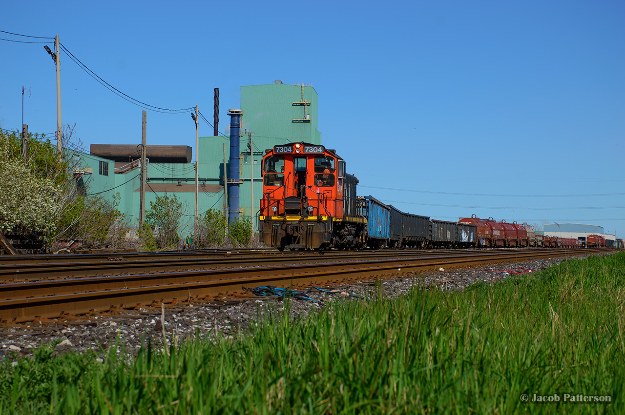 One of a handful of GMD SW1200RSus left on CN's roster (or assigned to subsidiaries), 7304 works the steel transfer at Parkdale Yard.