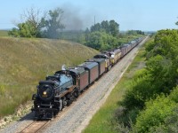 On the second last day of it's Calgary-Mexico City round trip, 2816 is seen about to duck under a wooden bridge just west of Waldeck on the Swift Current Sub. 