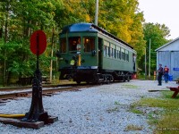 Montreal & Southern Counties Railway interurban car 107 is seen at the switch to the Halton County Radial Railway's east turning loop on one of its first runs in a number of years.  This evening was an event for their membership (and invited photographers) in celebration of the museum's 70th anniversary, having been founded in January 1954.  Car 107 was the museum's third acquisition, and their first interurban car.  Built by the Ottawa Car Company in 1912, it saw service until 1955, and was acquired by the museum in 1956.

<br><br>The public event will take place next Saturday, September 21, 2024 at 1:30pm, featuring a number of invited guests (including founding member, Bob Sandusky,) a parade of streetcars, and unveiling of a plaque at the site of the first spike (just behind me in this image.)  