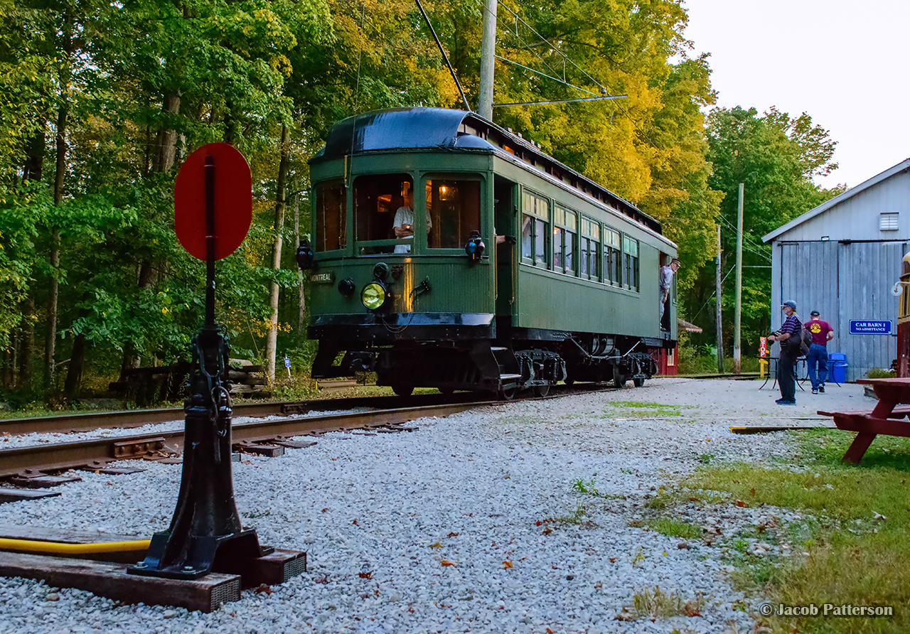 Montreal & Southern Counties Railway interurban car 107 is seen at the switch to the Halton County Radial Railway's east turning loop on one of its first runs in a number of years.  This evening was an event for their membership (and invited photographers) in celebration of the museum's 70th anniversary, having been founded in January 1954.  Car 107 was the museum's third acquisition, and their first interurban car.  Built by the Ottawa Car Company in 1912, it saw service until 1955, and was acquired by the museum in 1956.

The public event will take place next Saturday, September 21, 2024 at 1:30pm, featuring a number of invited guests (including founding member, Bob Sandusky,) a parade of streetcars, and unveiling of a plaque at the site of the first spike (just behind me in this image.)