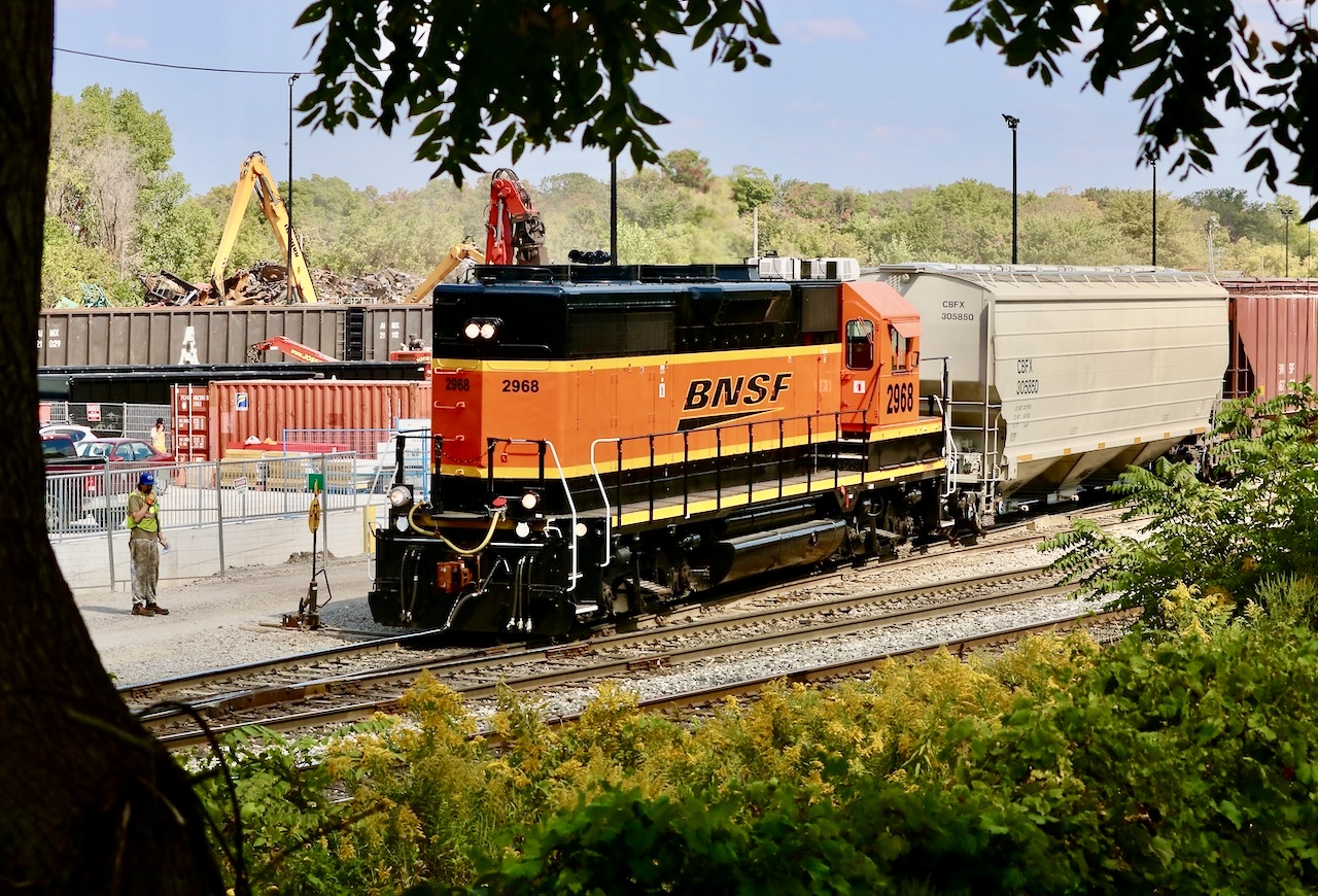 A diamond in the rough. Pristine looking BNSF GP39V  2968 certainly doesn’t show its age with a nice coat of BNSF paint. Original built as a GP35 for the GM&O back in the 1960, complete with second hand Alco trucks. When BN approached VMV years ago for an option for secondhand four axle units, rebuilding old GP30’s and GP35’s became the reality, especially considering the number of hulk VMV could get its hands on. The GP35 was well known for maxing out its prime mover and often damaging its electrical system in the process, often sidling the model with electrical fires, which made them candidates for early retirement. Thankfully EMD later came out with the dash-2 electrical system, which helped eliminated a lot of headaches.  Today CN is still short of four axle power and has been turning to BNSF to fill the void. I was shocked to see this nice clean unit working Kitchener yard Monday.  Unfortunately the stalled 533 Sunday and derailed 540 Monday killed any chance of getting a 568 this day.