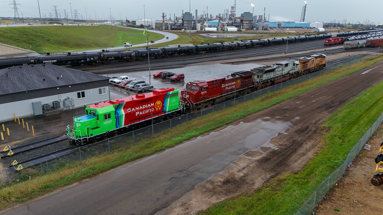 CP 1002, a unit converted to operate on Hydrogen sits on the Clover Bar shop track with CP 8013, CP 7022 and UP 7765.