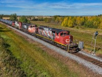 L 51151 16 passes the approach signal to the Gaudin Interlocking with CN 5267, CN 5316, CN 5293 and 71 cars.  While this part of the Vegreville Sub is OCS, there are two interlocking with searchlight signals; the Gaudin Interlocking and the Bruderheim Interlocking, which both cross CPKC lines. 