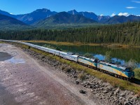 The Canadian departs Swan Landing and runs out the final miles of the Rocky Mountains on the second day of its journey to Toronto. 

P 00251 16: VIA 6451, VIA 6440 – 21 cars