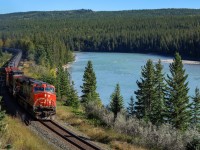 CN U 74351 16 with CN 2623, IC 2708 run alongside the Athabasca River with 105 cars of oil from South Beamer, Alberta. 