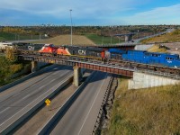 M 31651 27 rolls across the Yellowhead Highway with a colourful consist at one of my favourite locations in the city. 