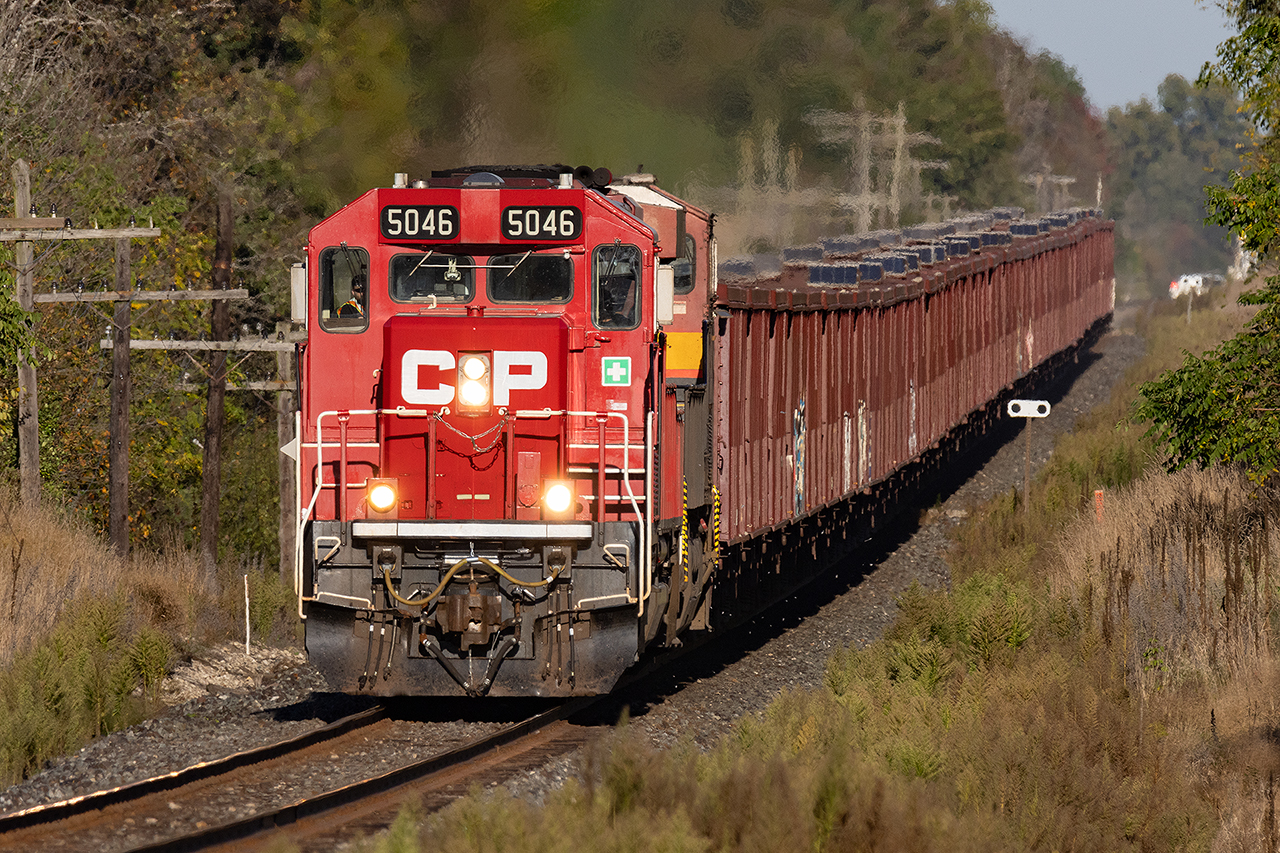 This is an interesting hobby. Sometimes incredibly tiring and frustrating. But once in a while, the scales balance. In perfect late afternoon light 5046, feeling a little bit SD40, a little bit SD45, flies towards Cambridge with the ubiquitous GE trailing...as it should be.