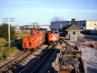 Heading into the evening sun, train 51, the "Super Continental" meets a southbound freight at Bradford.<br><br><i>Scan and editing by Jacob Patterson.</i>