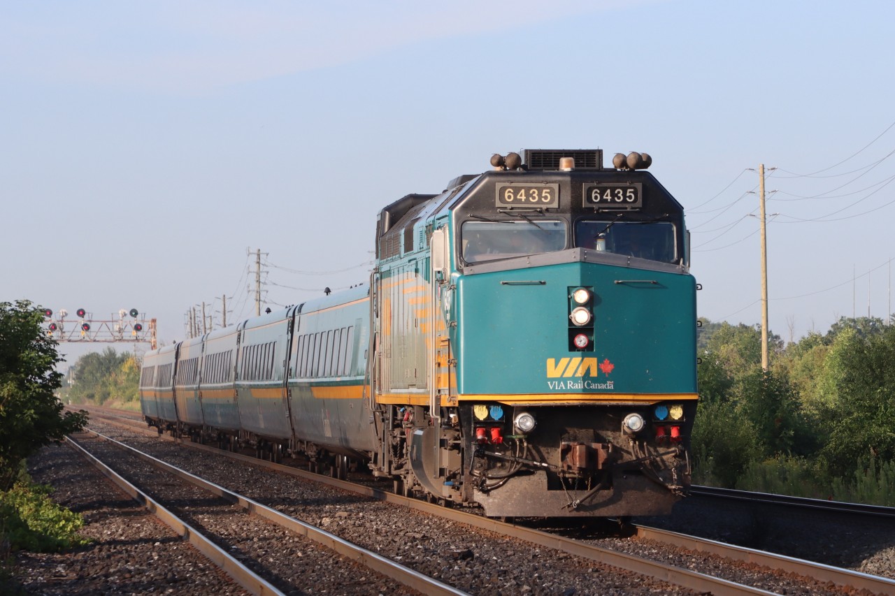 V82 at track speed about to pass through the Bronte GO station, next stop Toronto Union Station.