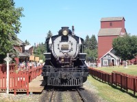 While the crew has a lunch break, ex Army 0-6-0 2023 simmers away.