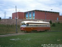 TTC PCC 4440 (A7-class, CC&F 1949) operates on the Long Branch streetcar route, laying over at Humber Loop before its trip west through Mimico to Long Branch Loop. The Long Branch streetcar, later the 507, connected here with the Queen streetcar and other services. In the background is the old Oshawa Group warehouse (IGA, Food City, Towers brands), just east of the <a href=http://www.railpictures.ca/?attachment_id=36009><b>Ontario Food Terminal</b></a>.
<br><br>
<i>John F. Bromley photo, Dan Dell'Unto collection slide.</i>