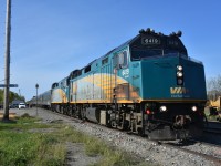 VIA 693 The Hudson Bay is making a scheduled station stop at Wabowden, MB Mile 136.4 HBR Wekusko Sub. on this beautiful September 18, 2024 morning. Supplies are off loaded, passengers get a chance to stretch their legs, and, VIA performs an unscheduled crew change.<br>
Radio troubles in what was lead unit VIA 6433 has the train running 6+ hours late at Wabowden due to overnight switching moves to reverse the two locomotives putting VIA 6419 in the lead. The new crew was trucked out in the white van to the remote location to take over the throttle. <br>
All part of the fun and adventure of riding this iconic train to Churchill. :-)