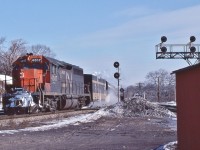 <br>
<br>
What is a VIA ?
<br>
<br>
All south west Ontario trains were 'Tempo' irregardless of the actual equipment assigned.
<br>
<br>
This is either  #73 or  #83 (Sarnia).
<br>
<br>
Per the signboard in the background, Bayview,  March  5, 1977 Kodachrome by S.Danko.
<br>
<br>
noteworthy
<br>
<br>
 CN 4016 4017 ( renumbered  9316 9317 in 1981) class GR-430b ( GMD 1967 built GP40 ) were higher geared with a  lower continuous tractive effort ( 50,000 verses the 57,000 CTE for sisters 4002 to 4015), per TSG
<br>
<br>
Circa  March 1977 the only blue & yellow livery were the three (nine car) Turbo Trains painted as such 1976
<br>
<br>
more
<br>
<br>
     <a href="http://www.railpictures.ca/?attachment_id=  8017 ">  black & white  </a>
<br>
<br>
sdfourty
