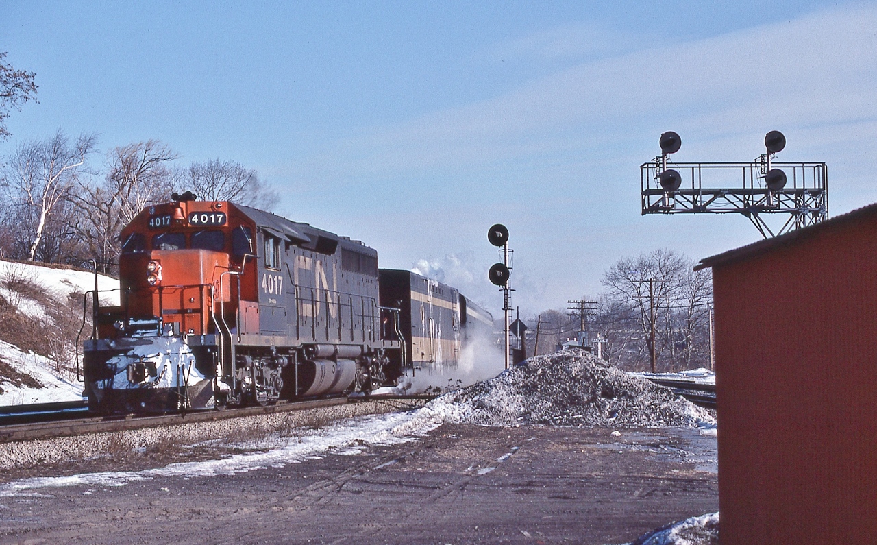 What is a VIA ?


All south west Ontario trains were 'Tempo' irregardless of the actual equipment assigned.


This is either  #73 or  #83 (Sarnia).


Per the signboard in the background, Bayview,  March  5, 1977 Kodachrome by S.Danko.


noteworthy


 CN 4016 4017 ( renumbered  9316 9317 in 1981) class GR-430b ( GMD 1967 built GP40 ) were higher geared with a  lower continuous tractive effort ( 50,000 verses the 57,000 CTE for sisters 4002 to 4015), per TSG


Circa  March 1977 the only blue & yellow livery were the three (nine car) Turbo Trains painted as such 1976


more


       black & white  


sdfourty