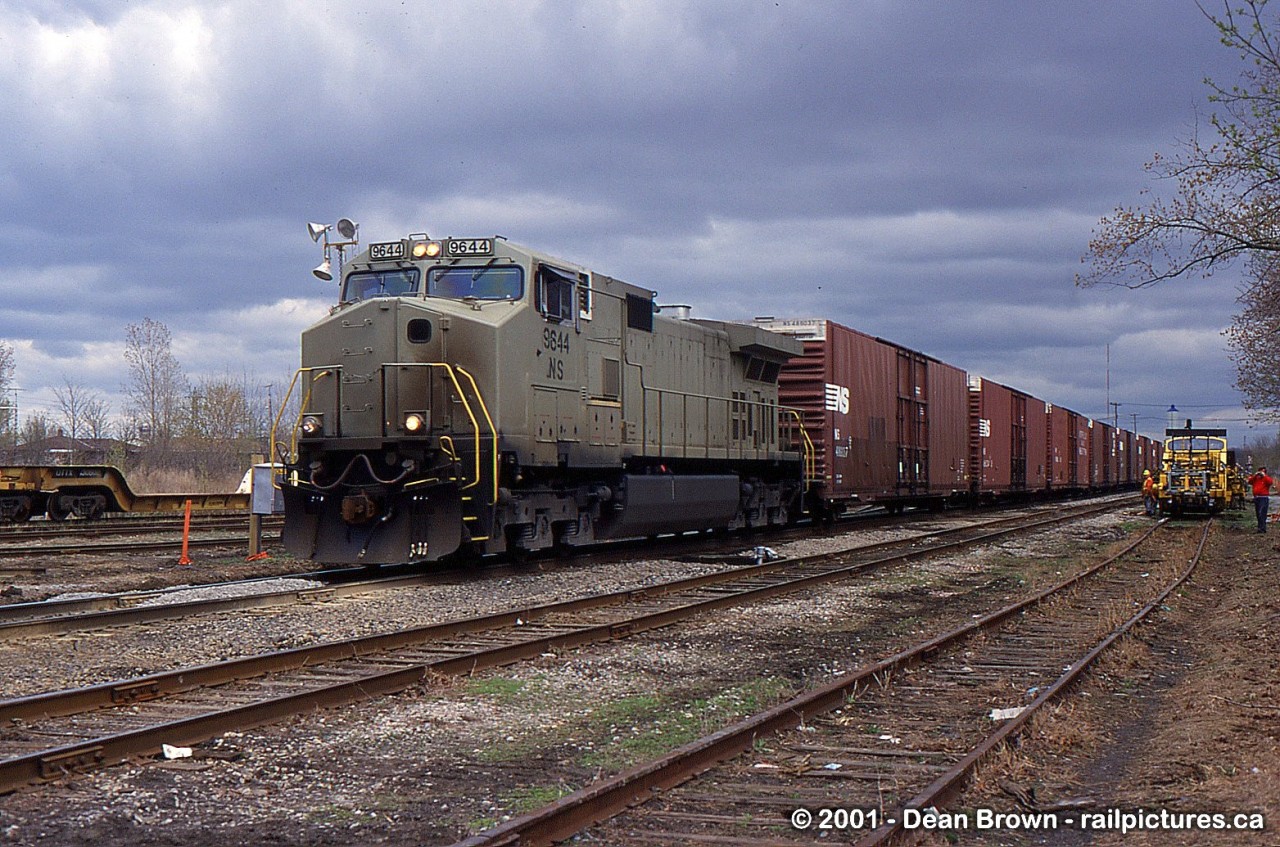 NS 99 with NS 9644 West at Mile 9.45 on the CN Grimsby Sub during the time of work block at Merritton lowering the north and south tracks under Merritt St Bridge.