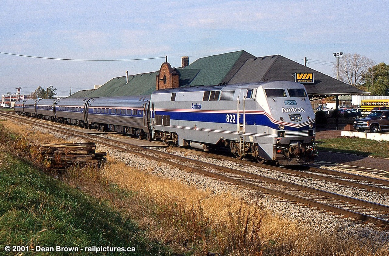 VIA 97 with AMTK P40 822 replaces the old F40PH on the Maple Leaf. Can't get the view from here anyone all the trees and grass are overgrown.