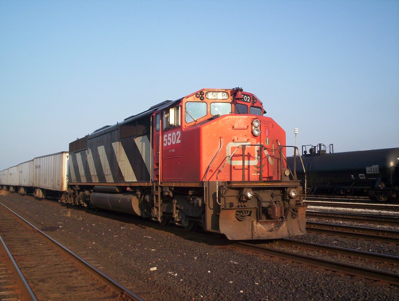 CN SD50AF 5502 at Sarnia with the triple crown roadrailer train #145, 5502 was the former 9902 the patch out number is clearly visible. The 9900 series units were the precursor to the following order of the SD60F.