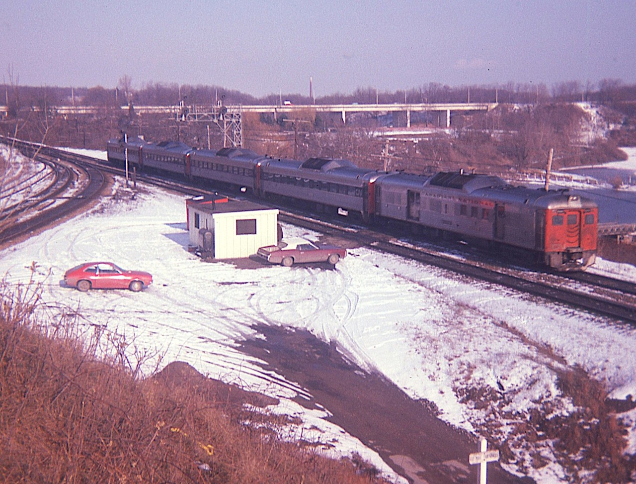 CN's budd cars; or 'railiners' were a very common sight thru Bayview back in the day when CN served many secondary passenger routes.  However, it wasn't very common to see five of them making up a train to Niagara Falls and back. Bit of a surprise on this relatively warm December afternoon nearly 50 years ago.