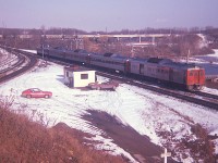 CN's budd cars; or 'railiners' were a very common sight thru Bayview back in the day when CN served many secondary passenger routes.  However, it wasn't very common to see five of them making up a train to Niagara Falls and back. Bit of a surprise on this relatively warm December afternoon nearly 50 years ago.