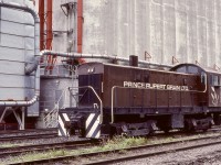 Believed to be the westernmost industrial railway operation in Canada (there were earlier logging lines on Haida Gwai), Prince Rupert Grain built a terminal on Prince Rupert harbour and alongside CN’s Skeena sub.  For switching loads and empties, in 1981 they acquired a 1955-built ex-Southern Pacific ALCo S-6 numbered (on paper, no external mark) 1219, as seen Monday 1981-10-05.

<p>When expanding export terminal business for several commodities developed near Prince Rupert on Ridley Island, Prince Rupert Grain built a new terminal there in 1984, and the original site appears to be a wood pellet terminal now.