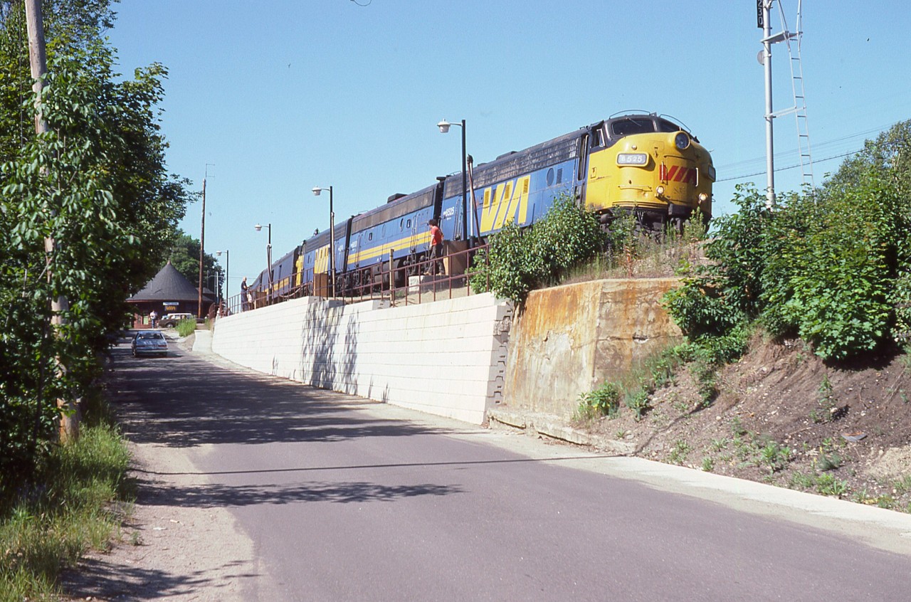 Nice afternoon at Parry Sound.  In this image, VIA 6525, 6653 and 6519 as #9 is stopped at the CP station for exchange of passengers.  I found it odd I did not see this 6525 very often; as a matter of fact I saw it more often as Algoma Central 1754 and even a few times on the Keokuk Junction Railway (same number) in Illinois.
Having said all this, I might add I sure miss those eventful days around Parry Sound. Can't believe it is so long ago already.