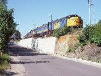 Nice afternoon at Parry Sound.  In this image, VIA 6525, 6653 and 6519 as #9 is stopped at the CP station for exchange of passengers.  I found it odd I did not see this 6525 very often; as a matter of fact I saw it more often as Algoma Central 1754 and even a few times on the Keokuk Junction Railway (same number) in Illinois.
Having said all this, I might add I sure miss those eventful days around Parry Sound. Can't believe it is so long ago already.