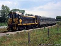 Trillium Railway ran an excursion trip between Port Colborne and Forks Jct during Canal Days in Aug of 1999. The power was PCHR S2 308, PCHR C425 6101, and the five NYC coaches from Medina, NY. PCHR 308 heads northbound at Elm St. in Port Colborne.