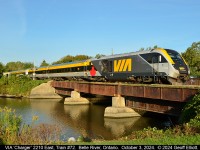 The look of the future is NOW....  VIA "Charger" #2210 leads train #72 through Belle River, Ontario on October 3, 2024.  With the arrival of the Charger sets the days of F40PH-2Ds and P42DC locos, with classic VIA consists are numbered.  Get your shots or lose out forever...  Remember those FP7's and FPA4's?  Same thing all over again.....