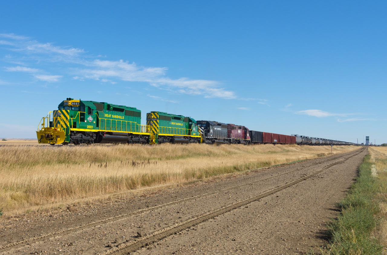 It is a pleasant Fall afternoon in western Saskatchewan as the GSR dose some switching at the elevator track in Cabri SK.