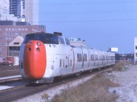 I was recently given a slide collection from a good friends late brother, Maurice Dann. Gong through them I found this great shot of the CNR Turbo heading into Union station for its Montreal run. Its not too often you would see the Turbo this clean and John street surrounded by nothing.