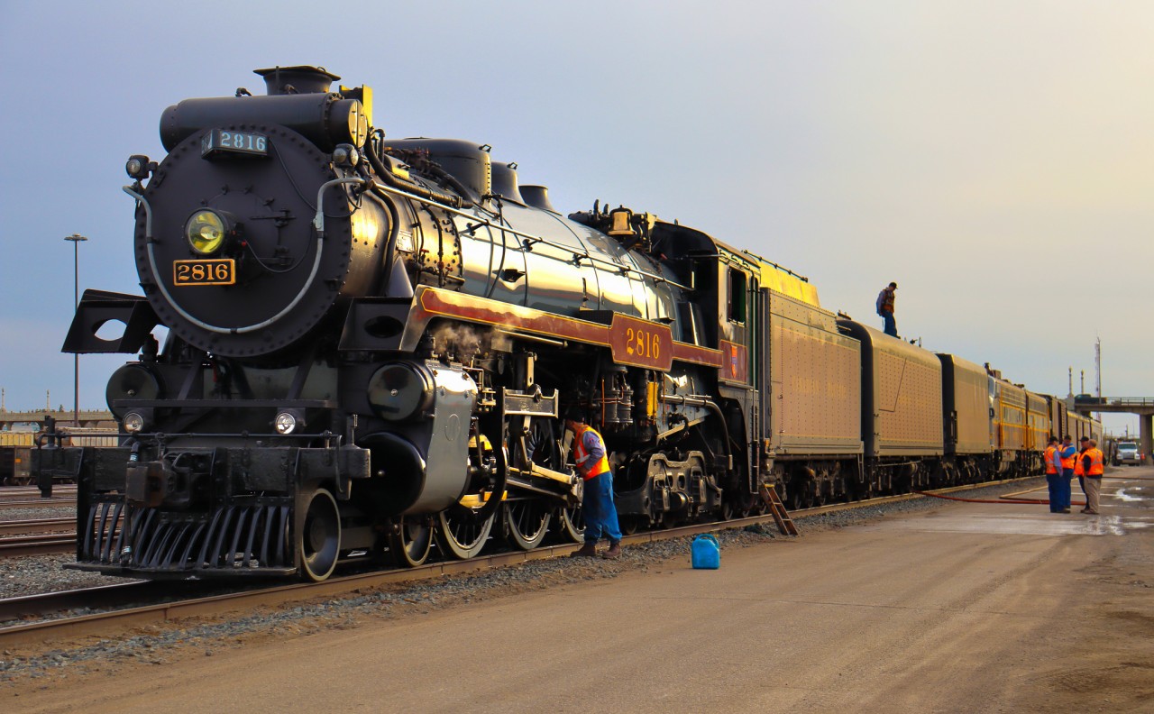 CP 2816 simmers down in Moose Jaw after a long days run, the crew, with many days ahead of them, are working hard to maintain 2816, and are servicing her for the night. This photo from April reminds me of the great time I had chasing 2816, and for the first time too. It was my first true train chase within the foam fest, and the experience was one to never forget.