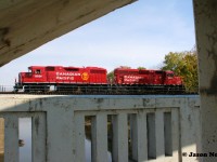 The crew of CPKC H70 have a great view for lunch as they pause over the Grand River in Kitchener, Ontario on the Waterloo Subdivision. The consist included CPKC 3024 and 2207, with GP38-2 3024 having been repainted in a fresh coat of CP red at the AMP facility in Dansville, New York. 