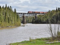 <br>
<br>
Westbound CPKC train, with CP 8185 and KCS4589, on approach Middleton.
<br>
<br>
At the Little Pic River, May 28, 2024 digital by S.Danko
 <br>
<br>
Same bridge – three different corporate names, two companies:
<br>
<br>
Canadian Pacific Kansas City Limited – above.
<br>
<br>
Canadian Pacific Railway Limited
<br>
<br>
     <a href="http://www.railpictures.ca/?attachment_id=  42768 ">  GE units  </a>
<br>
<br>
CP Rail - division of Canadian Pacific Limited
<br>
<br>
     <a href="http://www.railpictures.ca/?attachment_id=  11907 ">  M series  </a>
<br>
<br>
and VIA Rail Canada Inc.
<br>
<br>
     <a href="http://www.railpictures.ca/?attachment_id=  1932 ">  F units  </a>
<br>
<br>
