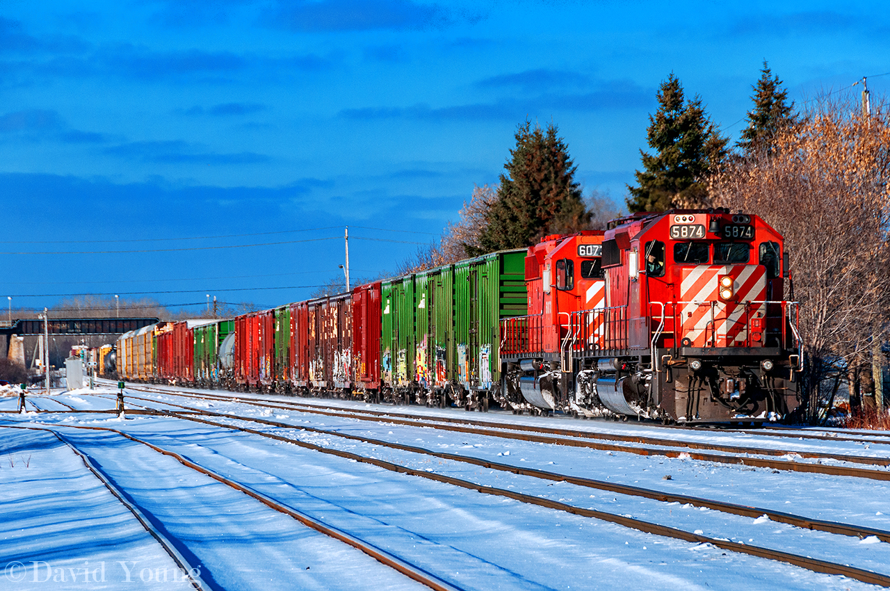 Veteran power leading trains displaying hints as to the reasons they got their nicknames. After the recession in the late naught's, early 10's the lumber and paper industry took a hit. Between Thunder Bay and Winnipeg trains 440/441 were nicknamed the "Paper Train" due to the amount of paper they hauled ex Thunder Bay, Dryden and Kenora along with their connecting trains to and from the east (Terrace Bay, Marathon, etc). By 2010 only Dryden and Thunder Bay mills (Terrace Bay would restart/idle a number of times over the course of coming decade) remained and other traffic from previously cancelled trains began to piggy-back on the normally paper/ lumber dominated freight. This version was a pre-cursor to today's 420-421 Toronto-Winnipeg freights. This day seen a late arrival of the Winnipeg- Thunder Bay freight 440 with a string of roughly 20 cars for the local Abitibi-Bowater plant on the headend followed by freight that once use to travel to Toronto on trains 220-221 ex Winnipeg.