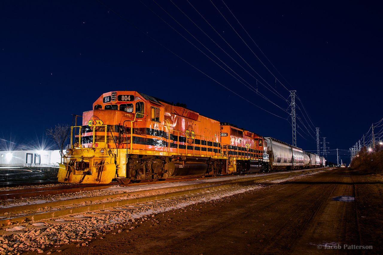 A reassigned slug set for the Goderich Exeter's Guelph Junction Railway operation is seen at the GJR/CN interchange on XT99, delivered by CN over the weekend.  In the foreground is the newly completed XT99a, a second interchange track at this location.  Space has been tight on the GJR the last few years, and continued expansion has been a priority, with XT99 being extended late in 2023, and XT97, another interchange track located around the wye off to the left, being added in 2020.