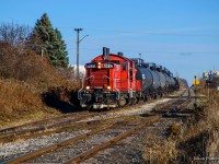 Autumn means propane season on the OSR, often requiring a couple extras running on a weekend to deliver cars to Factor Gas in St. Thomas.  A par of OSR's ex-CP pups are lifting inbound cars out of the Wabash Transfer before shoving back to Factor and delivering empties to CN.