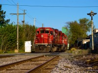 After setting off interchange traffic for CN, H42 returns light power up the Belt Line to Kinnear Yard.