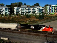 CN 3331 with a vintage CN logo on the long hood leads CN 322. This logo was briefly used by CN after its founding and was based on the Canadian Northern's logo.