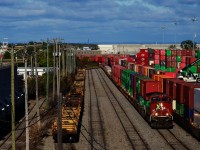 CPKC 2-112 is arriving in Lachine IMS Yard, with the conductor getting ready to throw a switch.