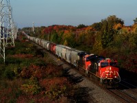 A 650-axle CN 108 is about 70% grain cars as it heads east through Beaconsfield.