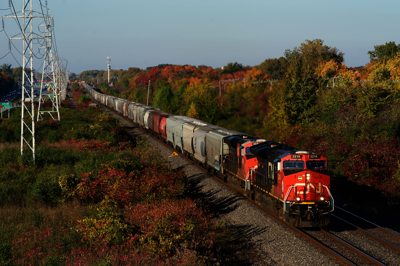 A 650-axle CN 108 is about 70% grain cars as it heads east through Beaconsfield.