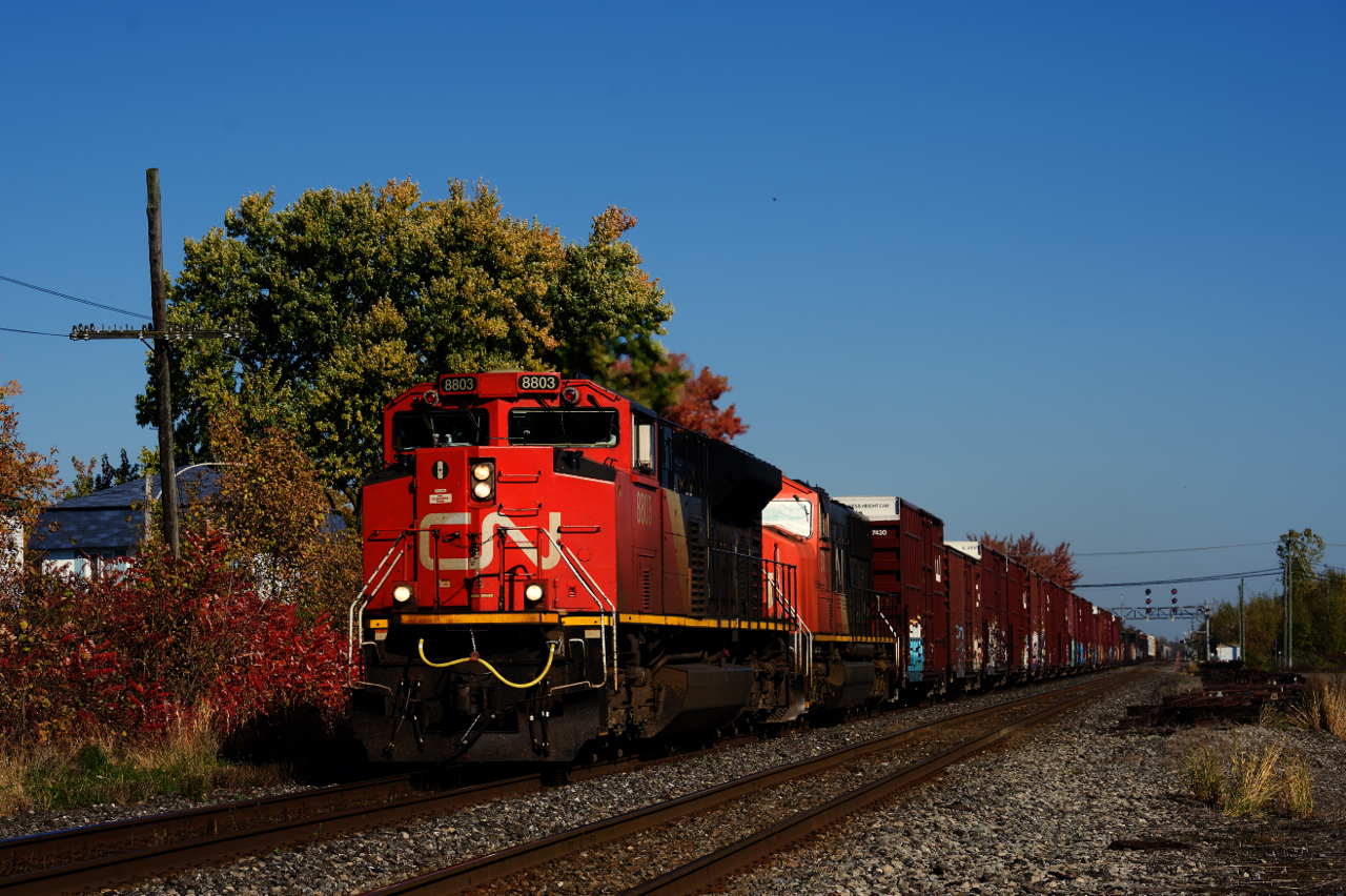 CN 369 has a pair of EMDs for power as it passes through Coteau.