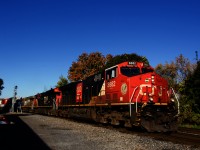 A CN 100 unit leads CN 120 past MP 4 of CN's Montreal Sub.